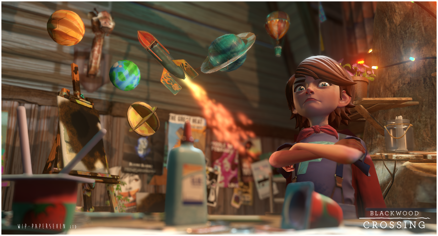 A scene from the game Blackwood Crossing - Finn is posing next to some of his cardboard creations.